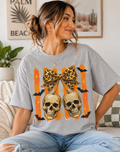 Skeleton With Cheetah Bow Graphic Tee